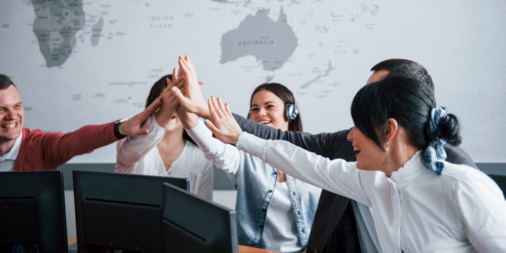 Support team helping customers by phone